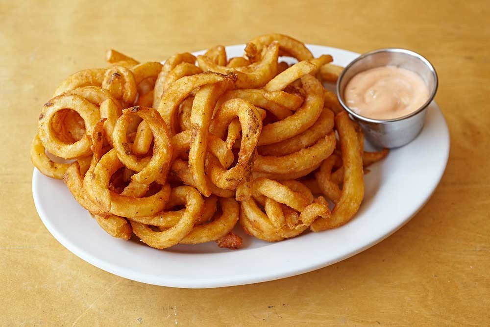 Crispy, curly, and oh-so-craveable. Dive into curly fries perfection! For  Orders: 0790067776 Abdoun Circle #burger #wings #chickenburger…